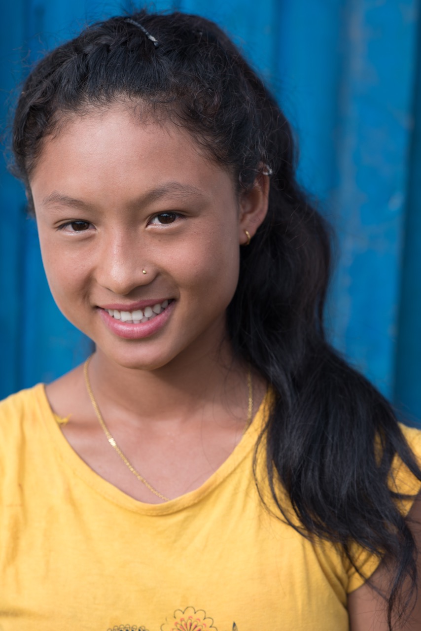 Rita Tamang, 16, is one of Visible Impact's 15 social champions from Kharanitar, a village in the Nuwakot district of Nepal still rebuilding after being devastated by the 2015 earthquakes. She aims to teach. And she has won local level titles in Taekwondo. (Photo by Brittany Wait)