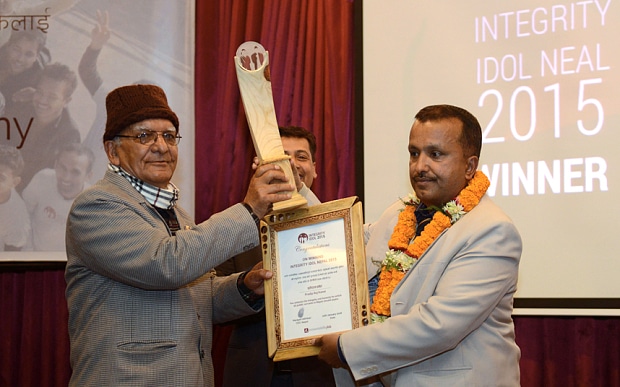 Pradip Raj Kandel (right) being crowned winner of 'Integrity Idol'